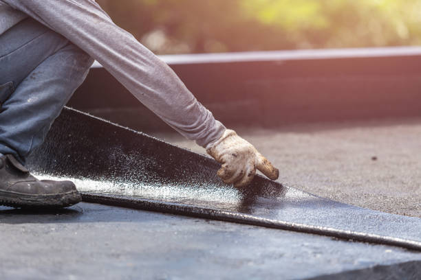 Professional Emergency Waterproofing technician working in Pomona, KS